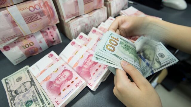 کاهش ارزش دلار به نفع چین شد
